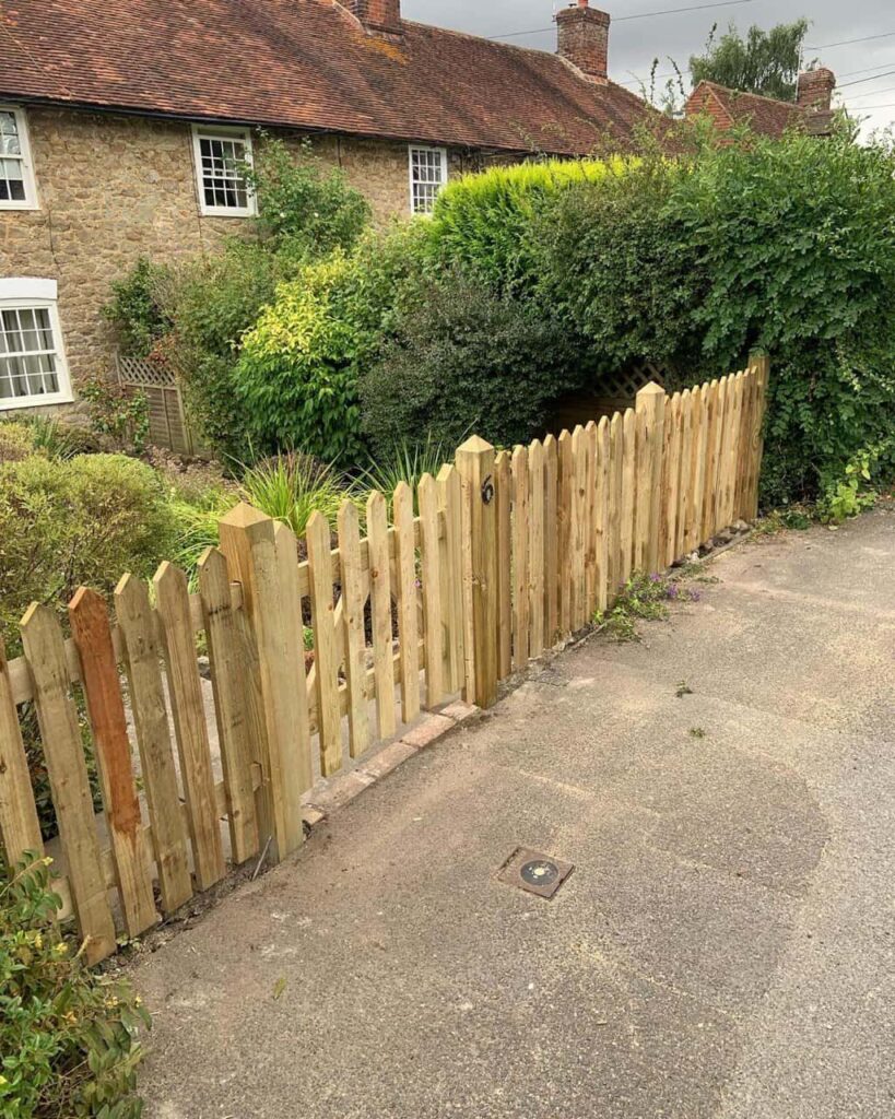 This is a photo of a picket fence and picket gate installed by Fast Fix Fencing Bury St Edmunds